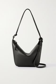 When investing in a new bag, you should be looking for a style that works hard - spacious enough for the essentials and easy to team with multiple outfits, for various occasions. Fitting the bill, Loewe's iconic 'Hammock' design is updated in a slouchier silhouette. Carry it over the shoulder, cross-body or as a wristlet. Loewe Mini Hammock, Loewe Hammock, Bag Shapes, Loewe Bag, Dream Bags, Big Bag, Body Harness, Mini Shoulder Bag, Wallet Accessories