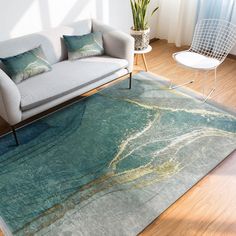 a living room with a couch, chair and rug