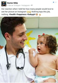 a man holding a baby wearing a stethoscope