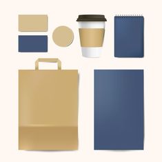 a paper bag, coffee cup, notebook and other items