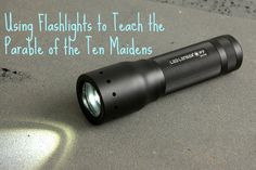 a flashlight sitting on top of a table with the words flashlights to teach the art of the ten maidens