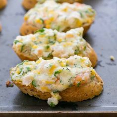 some food that is sitting on top of a baking sheet and ready to be eaten