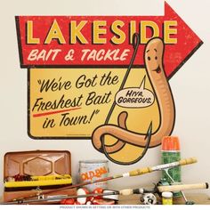 there is a sign on the wall that says lakeside bat and tackle, we're got the freshest bat in town