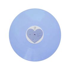 a blue record with a white heart on the side and an inscription that says love