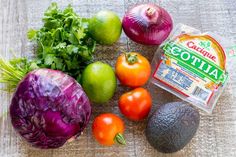 an assortment of fruits and vegetables on a table