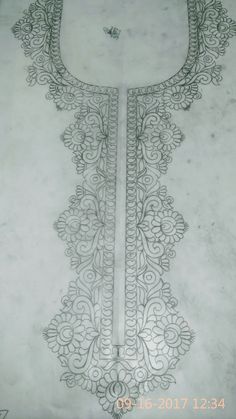 an intricately designed piece of cloth is shown in black and white, as well as the