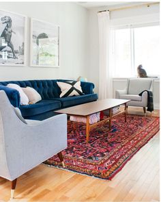 the living room is clean and ready to be used as a den or sitting area