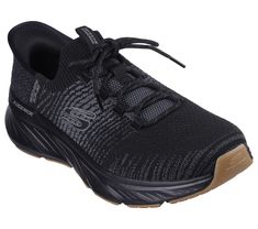 Show off your comfort wearing Skechers Hands Free Slip-ins Relaxed Fit Edgeride - Raygo. This sporty vegan design features a heathered engineered knit upper with an Exclusive Heel Pillow , adjustable laces, and a cushioned Skechers Air-Cooled Memory Foam insole. Our Planet Matters Good for your feet. Good for the world. | Skechers Men's Slip-ins RF: Edgeride - Raygo Sneaker | Extra Wide Width | Skechers Hands Free Slip-ins for an easy fit | Exclusive Heel Pillow holds your foot securely in place | This product's upper is made with at least 20% recycled content by weight, which helps reduce waste. | Skechers Air-Cooled Memory Foam cushioned comfort insole | Relaxed Fit for a roomy comfort fit at toe and forefoot | Crafted with 100% vegan materials | Heathered engineered knit upper with adju Vegan Design, Trainers Fashion, Lace Up Wedges, Skechers Women, Comfort Wear, Reduce Waste, Athletic Fashion, Mens Fashion Shoes, Canvas Shoes