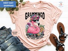 Grammingo Shirt, Flamingo Grammingo Like A Normal Grandma Only More Awesome Shirt, Cute Grandma Shirt, Cute Flamingo Tee ORDERING: 1. Review all photos 2. Choose Size and Color from drop-down menu 3. If personalization box is available, add your text color 4. Add each shirt to cart one at a time 5. Click "Add to Cart" - you can go back to add more products 6. Click "Proceed to Checkout" 7. Add note to seller for any requests * We use several different brand shirts, all of them are premium quality and soft shirts. The brands we send may vary depending on our stock situation. * We guarantee 100% satisfaction. The brands we use in- clude premium quality shirt brands such as Bella Canvas, Gildan Soft Style, Circle, Outlash. BULK DISCOUNTS AND SPECIAL REQUESTS: We offer bulk discounts and are o Flamingo T Shirt, Cute Grandma, Cute Flamingo, Flamingo Shirt, Grandma Shirt, Grandma Shirts, Brand Shirts, Branded Shirts, Text Color