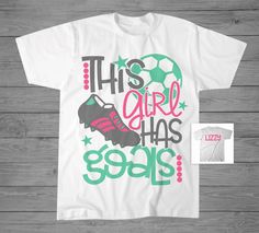 this girl has goals t - shirt with soccer shoe on the front and pink shoes on the back