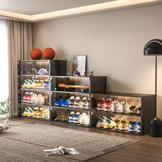 a living room filled with lots of different types of shoes on display in front of a window