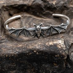 IF YOU REQUIRE A LARGER QUANTITY THAN IS SHOWING PLEASE CONTACT US WE MAY BE ABLE TO ACCOMMODATE YOU *   Amazing details on our realistic flying bat *   Perfect Christmas Gift *   Handmade from .925 sterling silver in our Devon workshop *   Postage is included with all items dispatched in the      UK *   If you change your mind for whatever reason we are      happy to accept a return, however, if your reason for      return is through no fault of our own we will deduct our initial postage costs. Bat In Flight, Bat Ring, Flying Bat, Gothic Vampire, Vampire Bat, Handmade Christmas Gifts, In Flight, Gift Handmade, Perfect Christmas Gifts