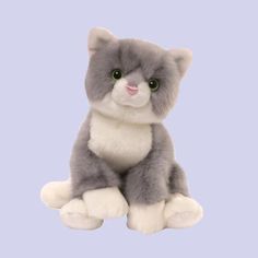 a gray and white stuffed cat sitting down