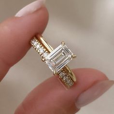 ✥ Ring Details ✥  ♦ Main Stone: Lab Grown Certified Diamond ♦ Main Stone Size: 9mmx7mm ♦ Main Stone Shape: Emerald  Cut ♦ Main Stone Color: Colorless ✥ Band Details ✥  ♦ Stone: Lab-Grown Certified Diamond ♦ Total Stone Size: 0.40CT ♦ Stone Shape: Round Cut ♦ Stone Color: Colorless ♦ Ring Metal: Sterling Silver, 10K/14K/18K Gold, Or Platinum. ♦ Metal Options: Yellow/White/Rose ♦ Nickle Free ♦ Free Shipping to the United States ⬥ Feel free to ask for the 360o video of the diamond, please don't hesitate to reach out to us for the video of the diamond. We will gladly provide the video of the diamond to you. ⬥ The listed ring is made as a custom order, the measurements or carat weight can differ slightly as per the availability of diamonds. To have a look at the multiple diamond options drop a خواتم خطوبة, Emerald Cut Engagement Ring, Dream Wedding Ring, Cute Engagement Rings, Future Engagement Rings, Emerald Cut Engagement, Emerald Cut Moissanite, Emerald Engagement Ring Cut, Dream Engagement