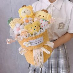 a girl holding a basket filled with stuffed animals and other stuff items in her hands