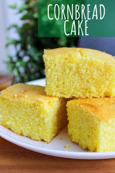 cornbread cake on a white plate with the words cornbread cake in front of it