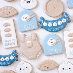 some cookies are laying on top of each other in the shape of animals and letters