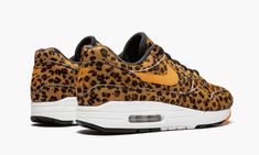 The atmos x Nike Air Max 1 “Leopard” is one of three colorways from the “Animal Pack 3. 0” collection released in 2019.  Japanese sneaker retailer atmos separated the animal prints from their famous “Animal” colorway of the Air Max 1 into three new versions of the silhouette, each featuring only one of the leopard, giraffe, and tiger prints across the entire upper.  This “Leopard” colorway is constructed in the faux fur leopard print with bright orange accents for the Swooshes, heel Nike logos, Nike Airmax 95 Animal Print, Nike Cheetah Sneakers, Nike Shoes Cheetah Print, Nike Air Max 90 Animal Print, Nike Animal Print Sneakers, Cool Air Max Shoes, Nike Blazer Animal Print, Cheetah Print Jordans, Nike Cheetah Shoes