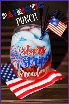 patriotic punch in a glass with toothpicks and an american flag