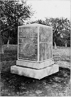 an old photo of a monument in the middle of a field with trees behind it