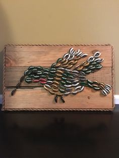 a wooden box with some metal decorations on it