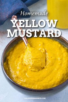 homemade yellow mustard in a bowl with a spoon