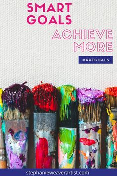 colorful paint brushes lined up with the words smart goals achieve more