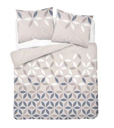 an image of a bed set with blue and white designs on it's sheets