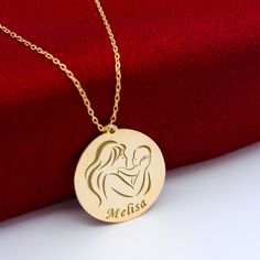 If you are looking for a meaningful and special gift for a mother who is devoted to her child, you are in the right place. You can add more meaning by writing the name and date on the necklace. Do not forget to contact us for this. Mother and child figures united in One Heart will be a great gift for a mother. Our mothers are very precious to us, as are all of us. And we do everything for their happiness. We created the design of this unique necklace by imagining the smile that would appear on t Personalized Necklace For Mother's Day Gift, Round Necklace For Mother As A Mother's Day Gift, Round Necklace For Mother's Day Gift, Round Necklaces As Mother's Day Gift, Round Necklaces For Mother's Day Gift, Custom Round Necklace For Mother's Day, Customized Necklaces For Mother's Day, Engraved Necklaces For Mother's Day, Birthday And Mother's Day Necklace With Engraving Option