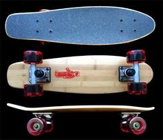 two skateboards sitting side by side, one with wheels and the other without wheels