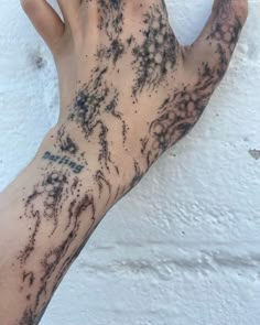 a person's hand with black ink on it