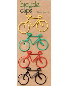 four bicycle clips in different colors and sizes on a card board with the words bacula clip