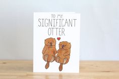 a card with two teddy bears holding hands and the words to my significant otter on it