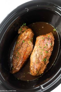 two pieces of meat in a slow cooker