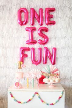 a birthday party with balloons and decorations