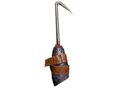 an umbrella that has been made out of leather and is attached to a hook with a long metal handle