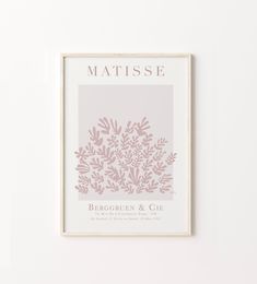 a framed print with the words matissee on it in pink and grey colors