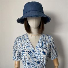 Introducing our Denim Bucket Hat: your go-to accessory for style and sun protection! Crafted from premium denim, it's not just a hat, it's a statement piece. With three chic colors to choose from, it's perfect for any occasion - from beach days to city strolls. Available in three sizes, including options for larger heads, ensuring the perfect fit for everyone. Treat yourself or surprise a loved one with this versatile and stylish bucket hat.Specifications Material: 100% Denim Size: M: 56-58cm Leather Beret, Knit Beret, Denim Bucket Hat, Personalized Hats, Hat Beret, News Boy Hat, Cloche Hat, Beret Hat, Beach Hat