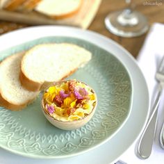 a plate topped with bread and an egg