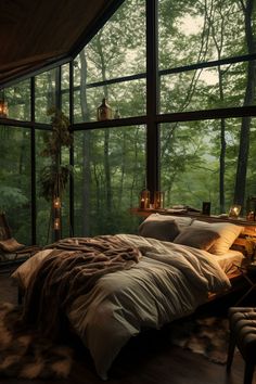 a bed sitting in a bedroom next to a window filled with lots of windows and lights