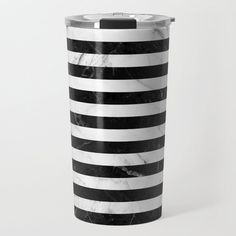 a black and white striped tumbler cup