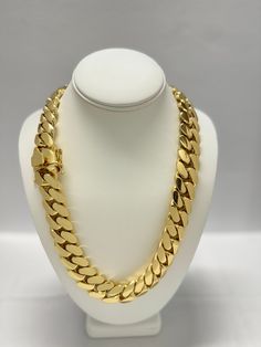 Indulge in the timeless elegance of our Cuban link chains and bracelets, meticulously handcrafted to perfection. Each piece is a solid statement of craftsmanship, created with passion and precision. Our Cuban link collection is plated not once, not twice, but five times with a lavish 14K Gold polish, ensuring a radiant and opulent finish that exudes sophistication. Embrace the uniqueness of handmade jewelry, where each link is carefully assembled to create a one-of-a-kind masterpiece. Our commitment to craftsmanship ensures that every detail is thoughtfully considered, providing you with a timeless accessory that stands the test of time. Please note that the artisanal nature of our creations means that some pieces may take up to 4 weeks to be crafted with the utmost care. Additionally, as Luxury Gold Cuban Link Diamond Necklace, Luxury Diamond Cuban Link Necklace With Curb Chain, Luxury White Gold Cuban Link Necklaces, Luxury White Gold Cuban Link Chain Necklace, Luxury Silver Cuban Link Jewelry, Luxury Elegant Cuban Link Necklace With Cubic Zirconia, Luxury Cuban Link Jewelry With Pave Setting, Luxury White Cuban Link Necklace With Curb Chain, Luxury Cuban Link Necklace In Cubic Zirconia