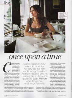 a woman sitting at a table with a coffee cup in front of her and the caption once upon a time