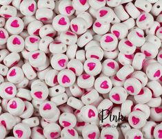 white and pink heart shaped beads