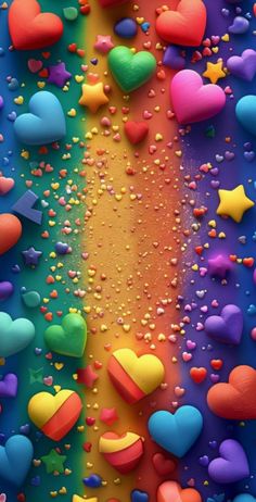 colorful hearts and stars on a rainbow colored background