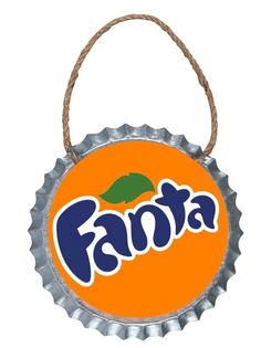 an orange bottle cap with the word fanta on it