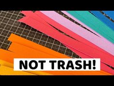 there is a sign that says not trash with different colors and sizes of ribbons on it