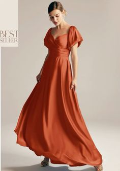 a woman in an orange dress is standing on a white background with the caption best seller