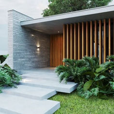 a modern house with wooden slats and concrete steps