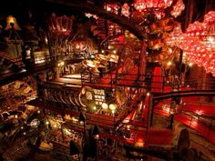 an aerial view of the inside of a building with many lights and decorations on it